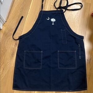 Rock Port Navy Apron featuring an embroidered South Carolina state palmetto tree